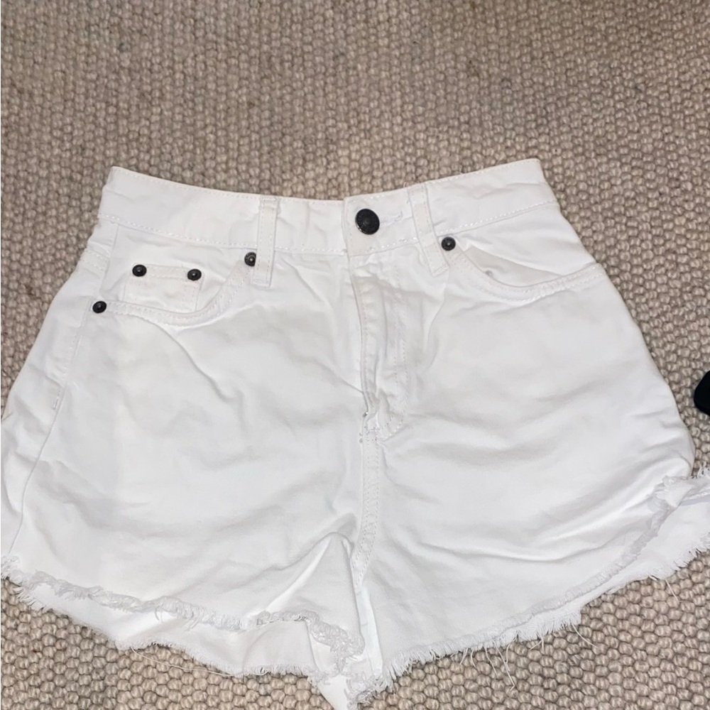 subdued white high rise denim shorts